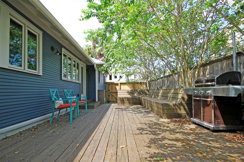 This is an example of a small transitional side yard deck in Houston with no cover.