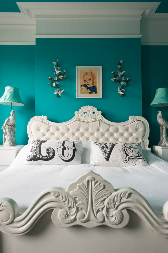 Design ideas for an eclectic master bedroom in Gloucestershire with carpet and blue walls.