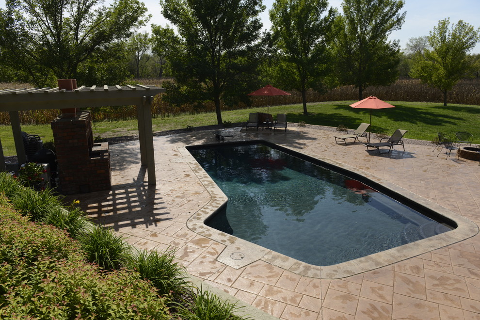 Design ideas for a small contemporary pool in Cedar Rapids.