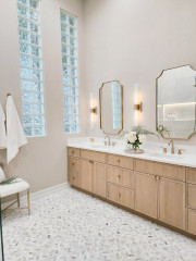 Warm Neutrals and Subtle Textures Create a Luminous Spa Bathroom
