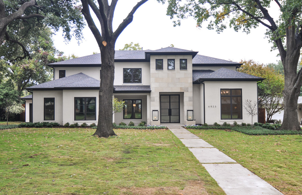 Large transitional two-storey stucco white exterior in Dallas.