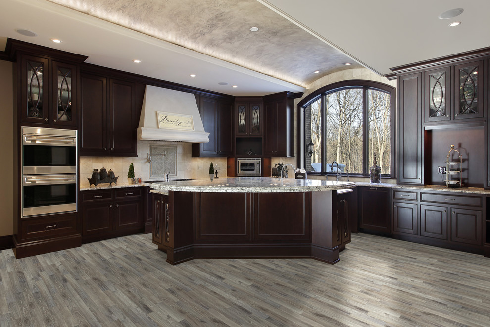 Example of a classic vinyl floor kitchen design