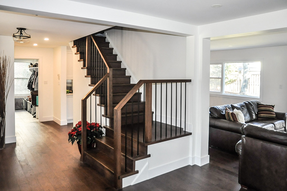 Mid-sized transitional dark wood floor and brown floor hallway photo with white walls