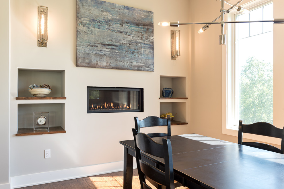 Open concept kitchen - mid-sized transitional u-shaped dark wood floor and brown floor open concept kitchen idea with an undermount sink, shaker cabinets, white cabinets, marble countertops, stainless steel appliances and an island