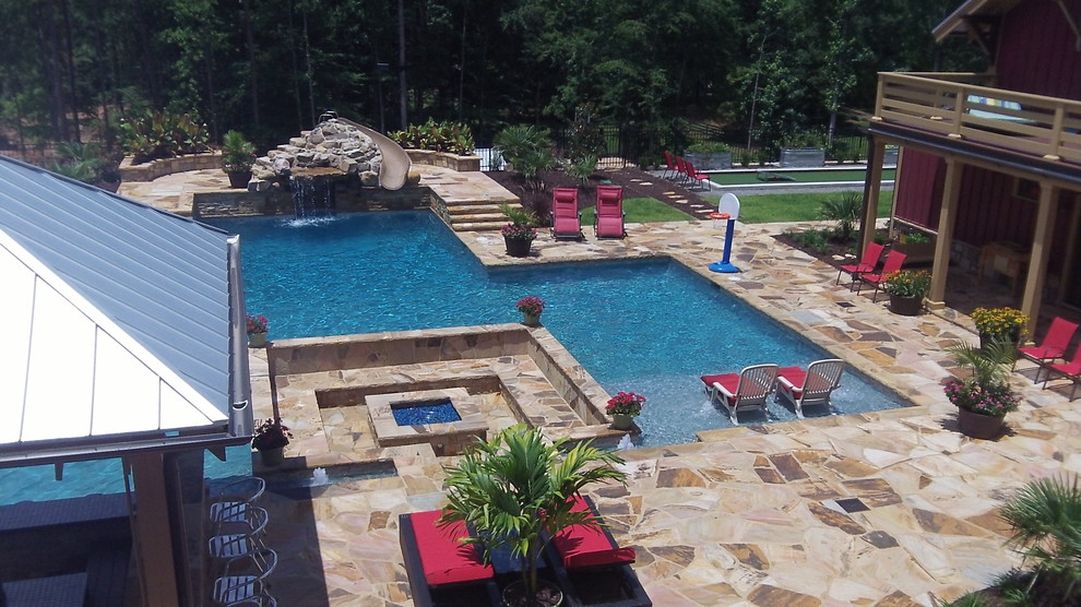 Photo of a beach style backyard pool in Atlanta.