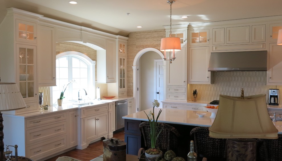 Home design - transitional home design idea with white cabinets, quartz countertops and white backsplash