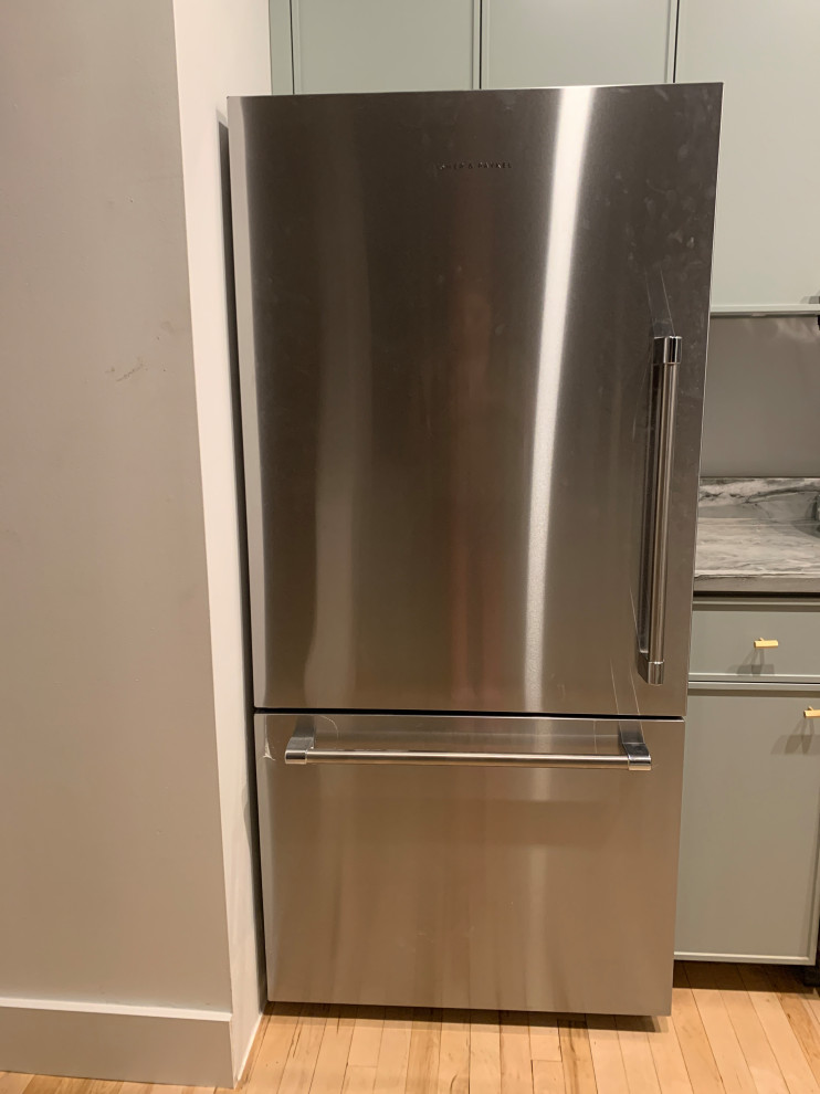 Help! Fridge against wall won’t open