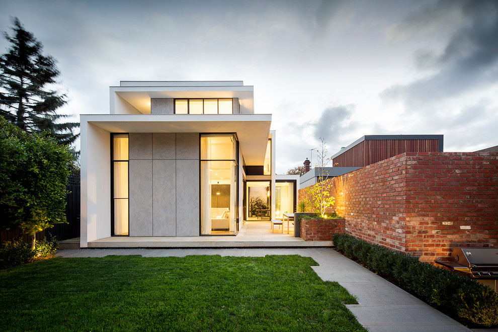 This is an example of a mid-sized contemporary two-storey exterior in Melbourne.