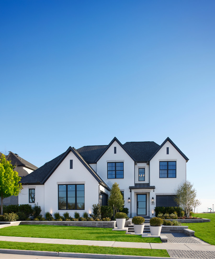 Inspiration for a transitional exterior home remodel in Dallas