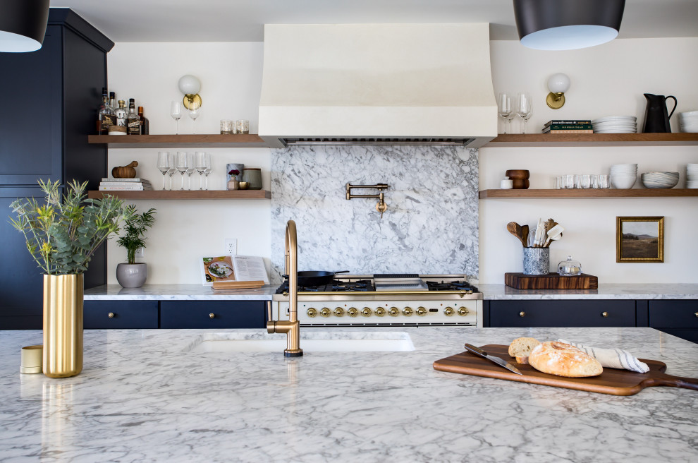 Example of a transitional kitchen design in Denver
