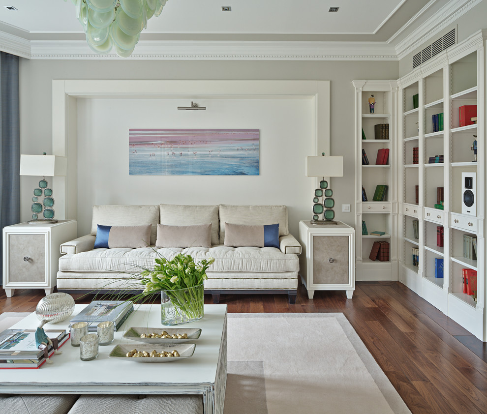 Contemporary enclosed living room in Moscow with beige walls, medium hardwood floors and a wall-mounted tv.