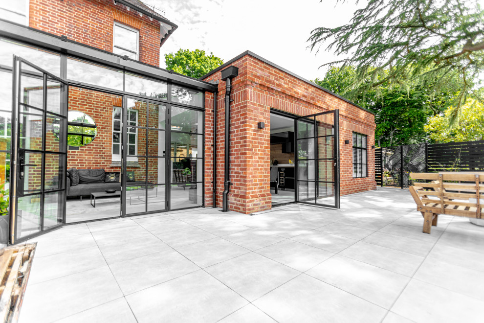 Design ideas for a large modern exterior in Kent.