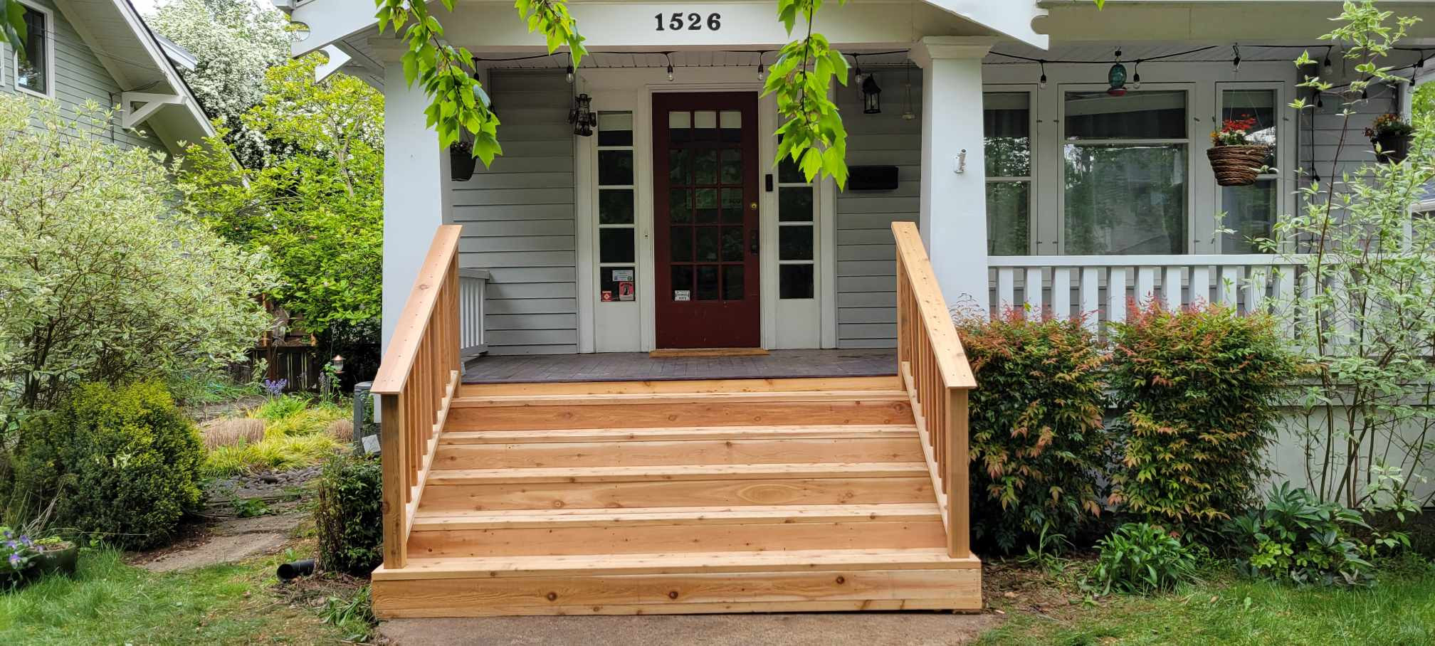 Cedar front steps with cedar railing