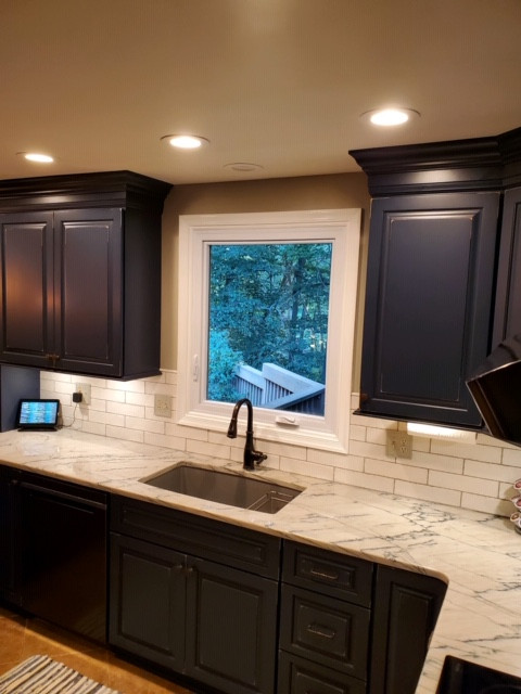 Dark Blue Cabinetry Makes for a Warm & Welcoming Kitchen