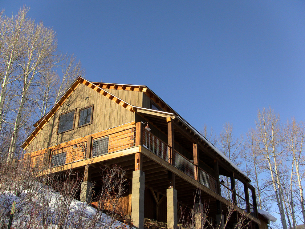 Inspiration for a rustic home design remodel in Denver