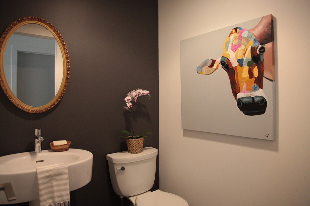 Inspiration for a small contemporary powder room in Other with black walls, a pedestal sink and a two-piece toilet.