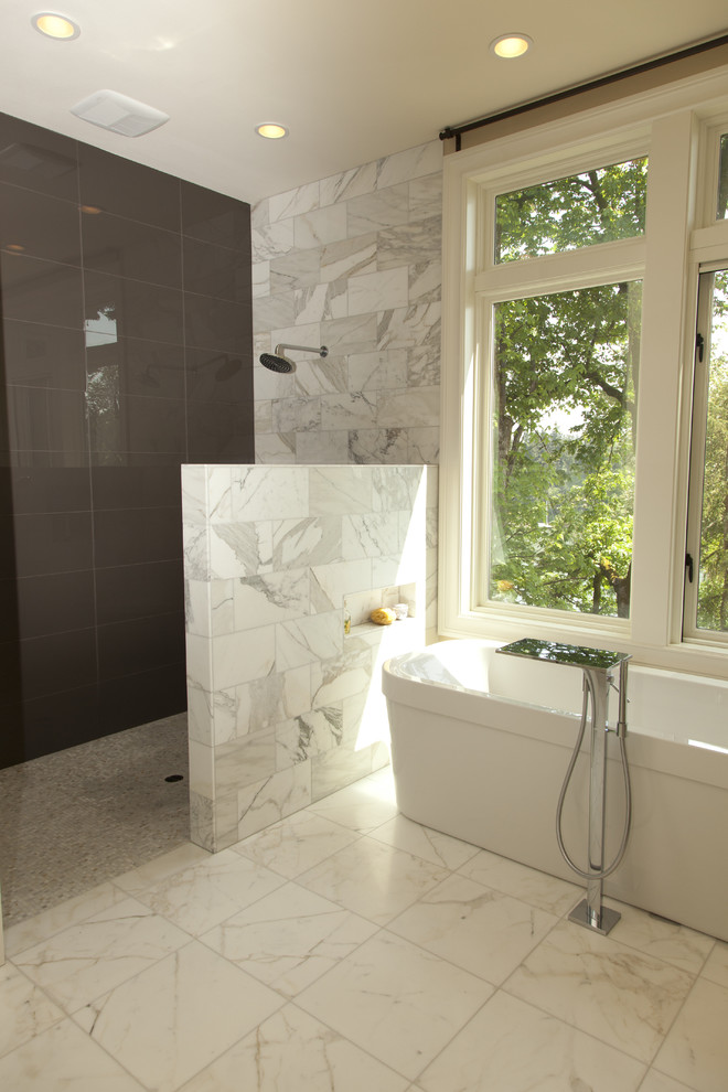 Photo of a contemporary bathroom in Portland with a freestanding tub and a curbless shower.