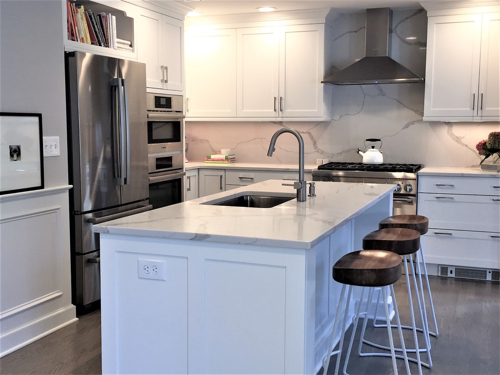 Example of a transitional kitchen design in New York