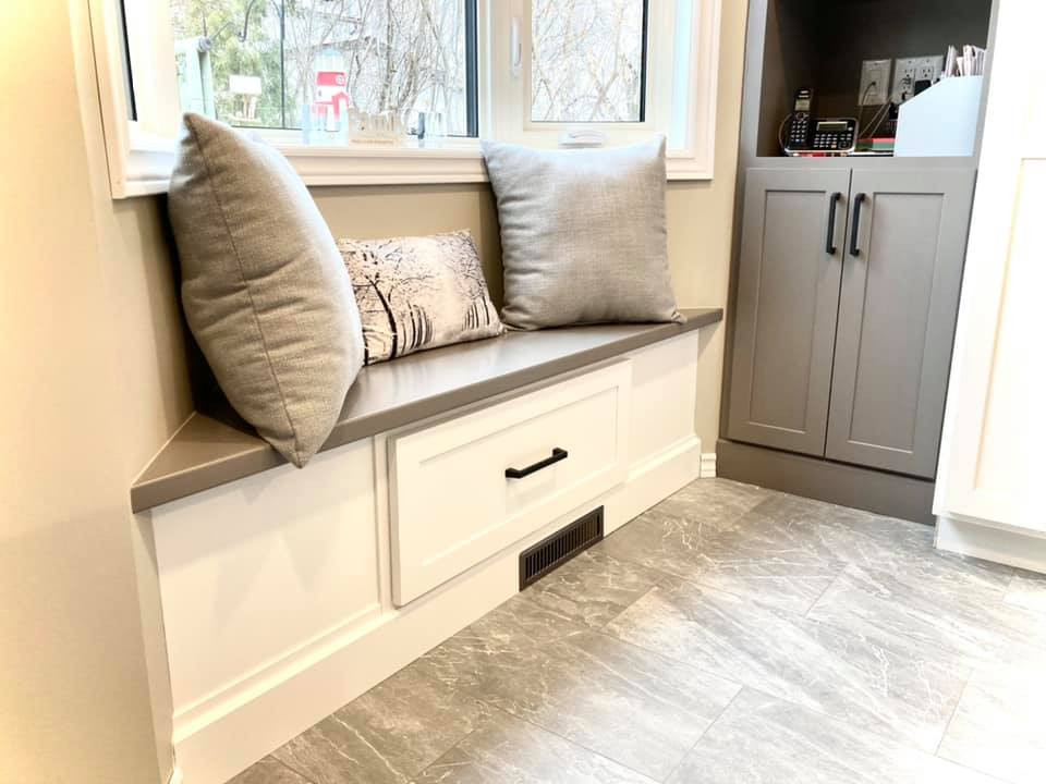 Inspiration for a mid-sized transitional galley ceramic tile and gray floor enclosed kitchen remodel with a double-bowl sink, shaker cabinets, white cabinets, quartz countertops, gray backsplash, ceramic backsplash, stainless steel appliances, an island and white countertops