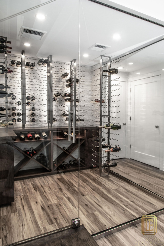 Inspiration for a mid-sized modern wine cellar in Chicago.