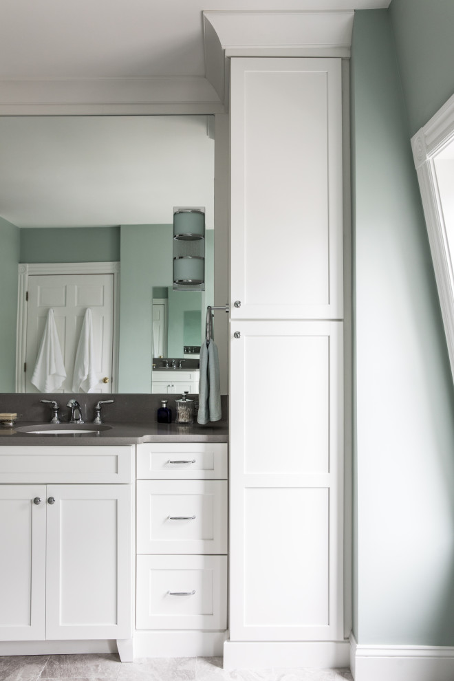 This is an example of a transitional 3/4 bathroom in Providence with shaker cabinets, white cabinets, a curbless shower, blue walls, porcelain floors, an undermount sink, quartzite benchtops, beige floor, an open shower and grey benchtops.