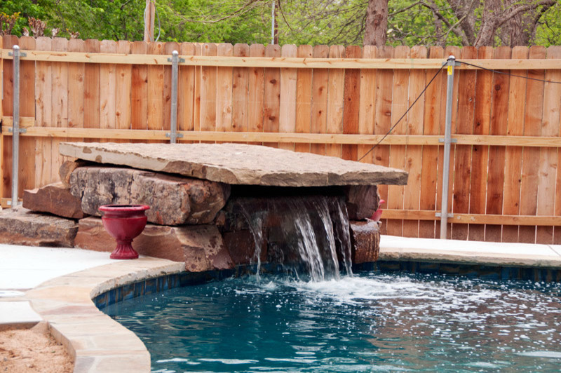 Home design - transitional backyard concrete and custom-shaped home design idea in Oklahoma City