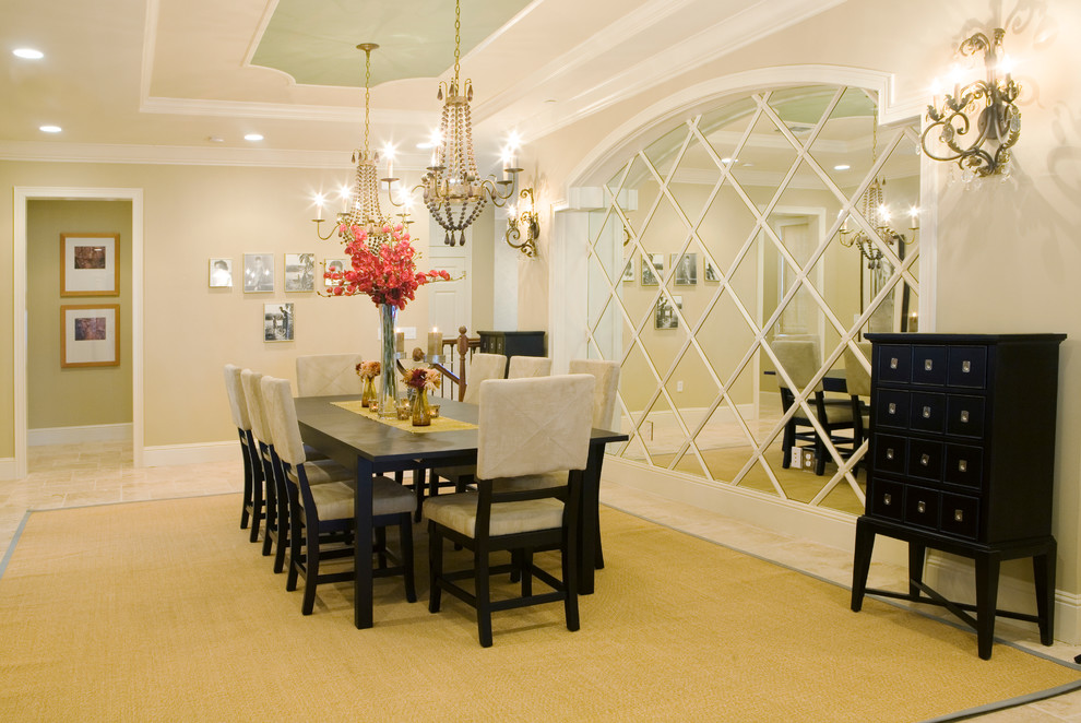 Photo of an expansive transitional separate dining room in Orlando with beige walls, travertine floors and no fireplace.