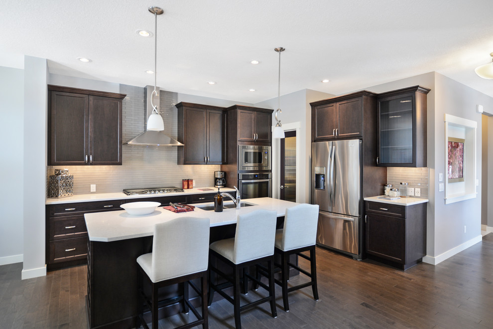 Inspiration for a transitional kitchen remodel in Calgary with gray backsplash and glass tile backsplash