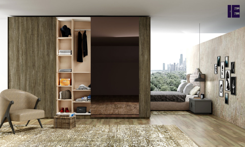 Inspiration for a mid-sized contemporary built-in wardrobe in London with glass-front cabinets and dark wood cabinets.
