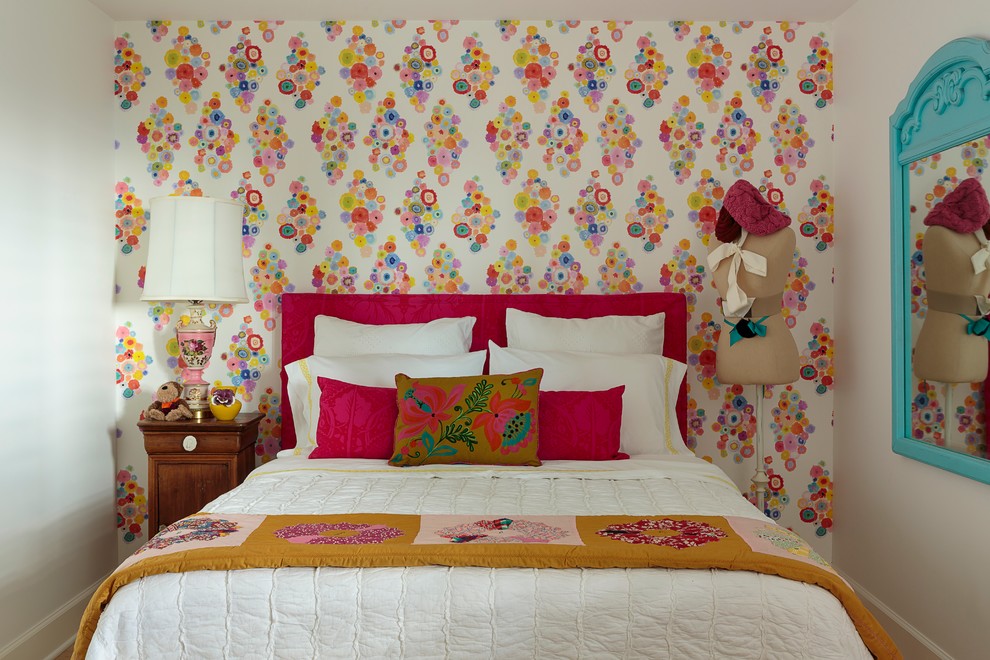 Mid-sized contemporary kids' room in Los Angeles with multi-coloured walls for girls.