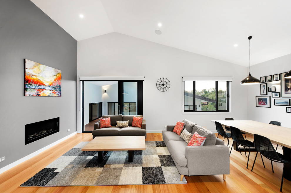 Example of a trendy home design design in Melbourne