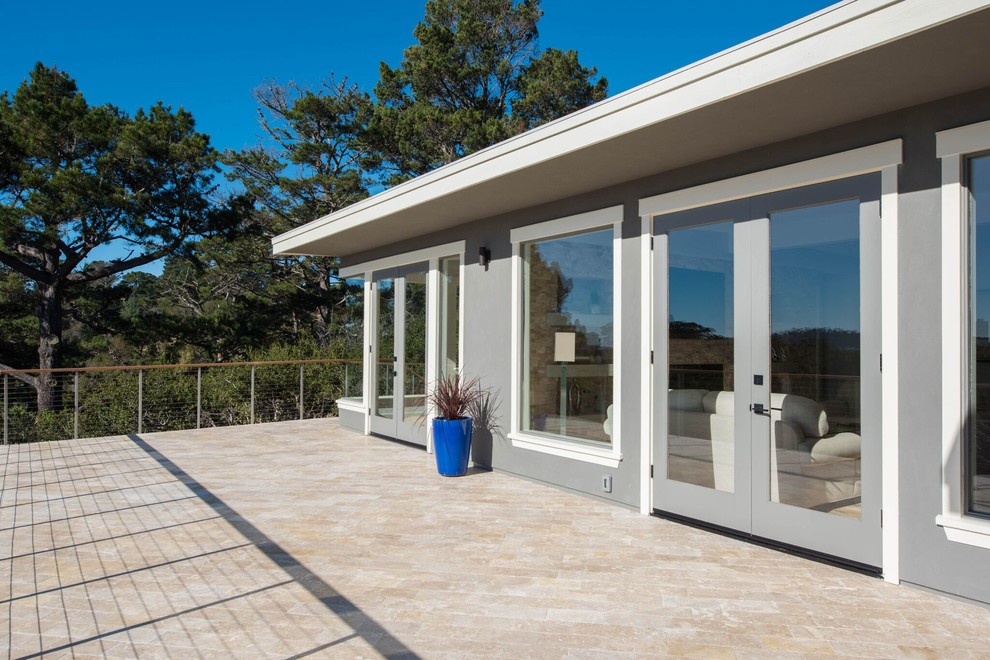 Inspiration for a mid-sized transitional backyard deck remodel in Orange County with no cover