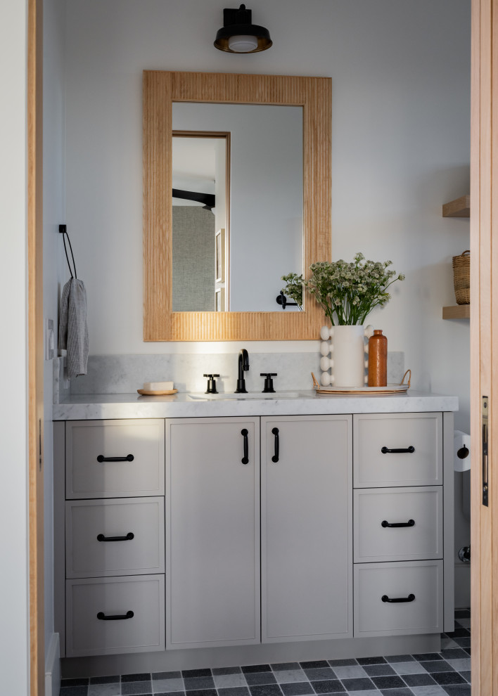Example of a transitional kids' single-sink bathroom design in Orange County with a built-in vanity