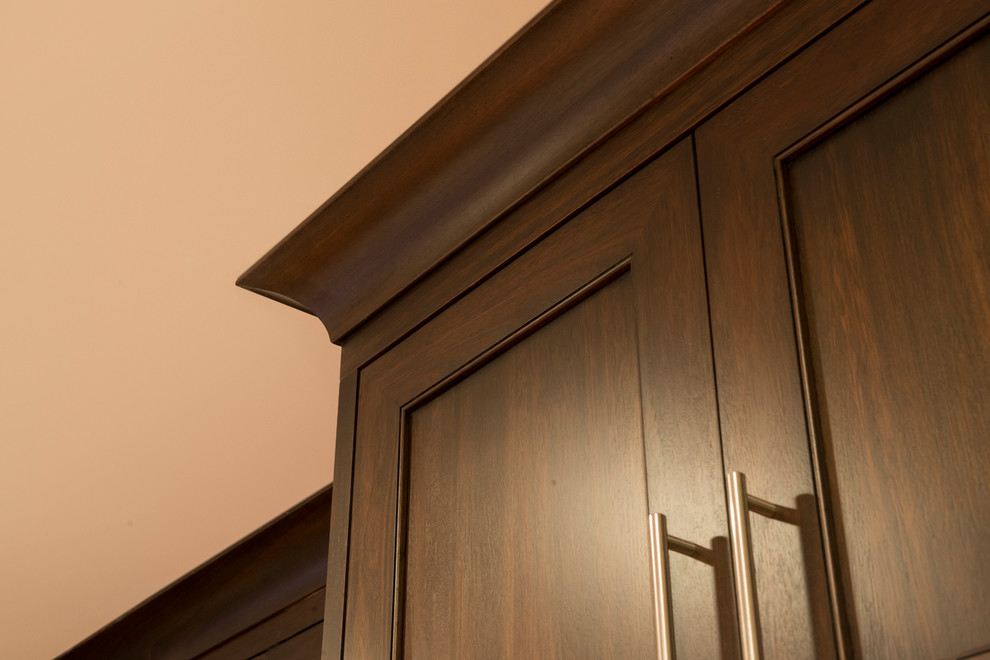 Example of a transitional home design design in Vancouver