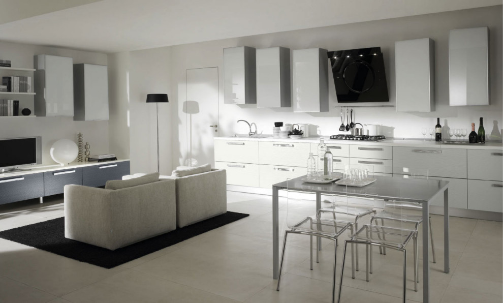 Foto di una cucina minimalista di medie dimensioni con ante bianche e top bianco