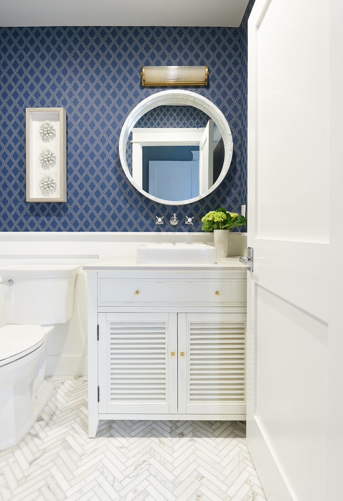 Design ideas for a mid-sized beach style bathroom in San Diego with shaker cabinets, white cabinets, a corner shower, white tile, ceramic tile, blue walls, ceramic floors, an undermount sink, engineered quartz benchtops, grey floor, a hinged shower door and white benchtops.
