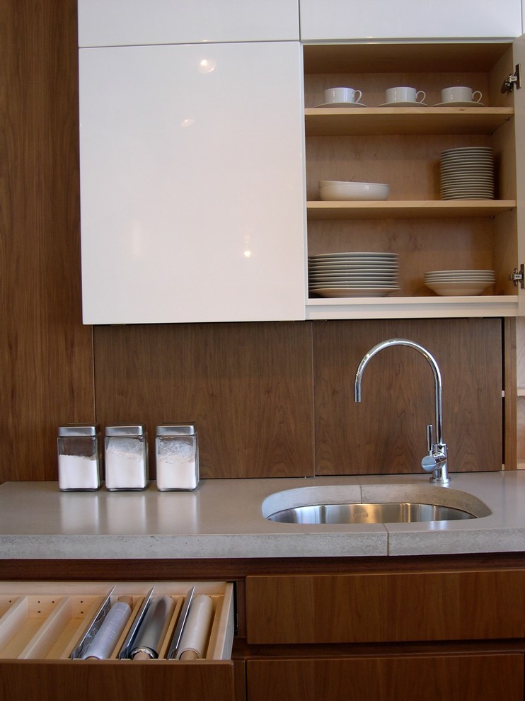Design ideas for a modern kitchen in Boston with an undermount sink and concrete benchtops.