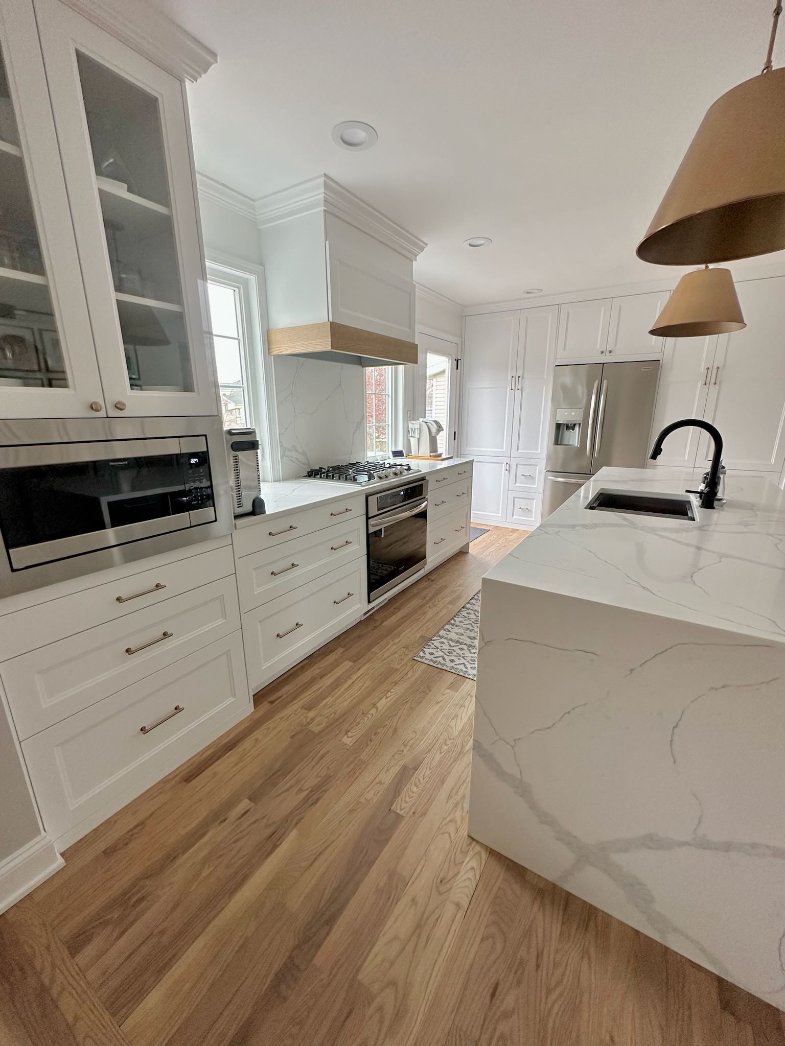 We have been working our way through this clients house helping them complete all their remodel ideas. This kitchen remodel was a high priority for the client, and involved moving windows, doors, and