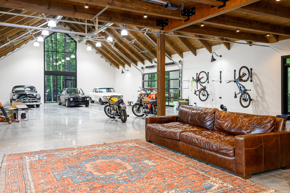 Design ideas for a country four-car garage in Other.