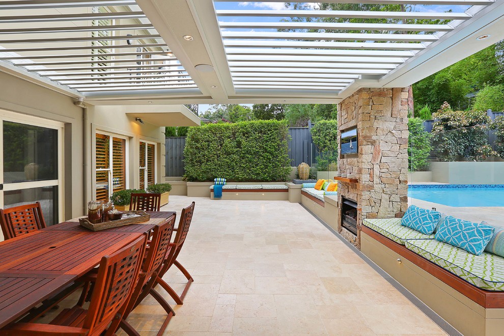 Design ideas for a contemporary backyard patio in Other with a fire feature, a pergola and tile.