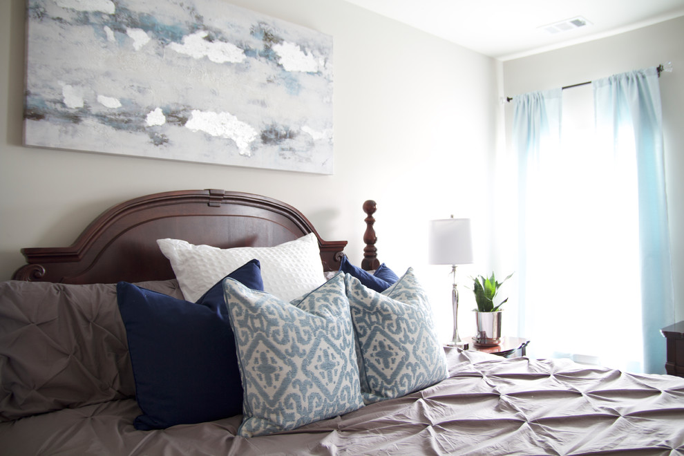 Example of a mid-sized transitional master carpeted and white floor bedroom design with gray walls