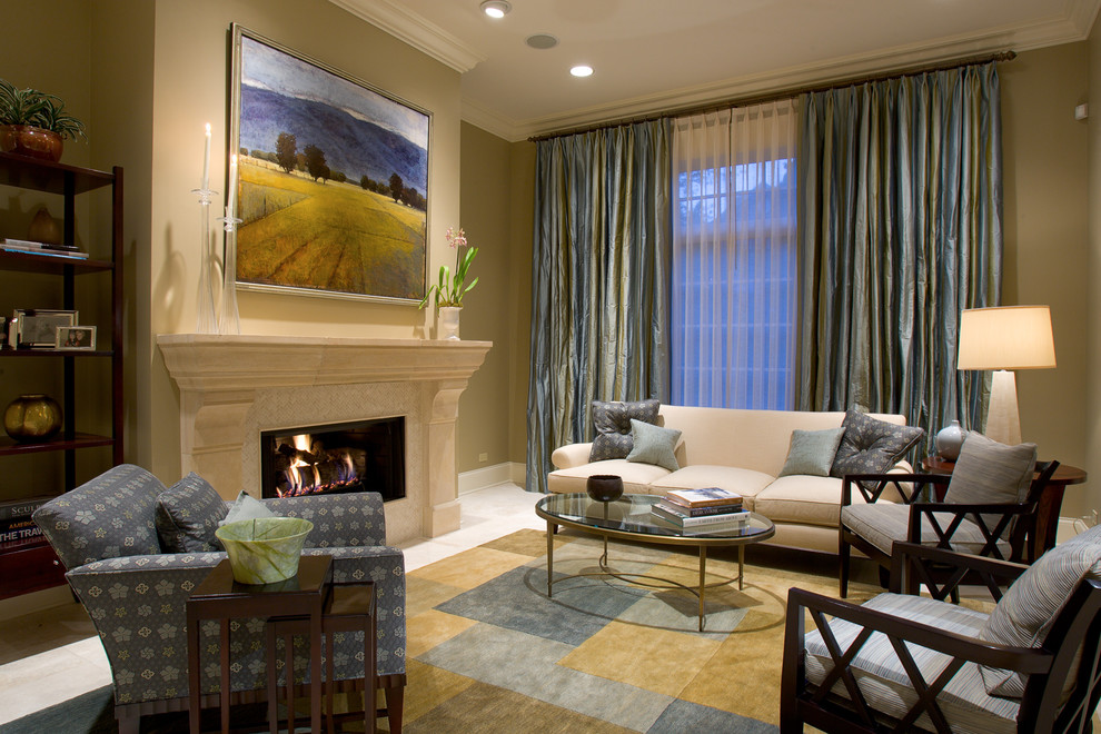 This is an example of a traditional living room in Chicago with beige walls and a standard fireplace.
