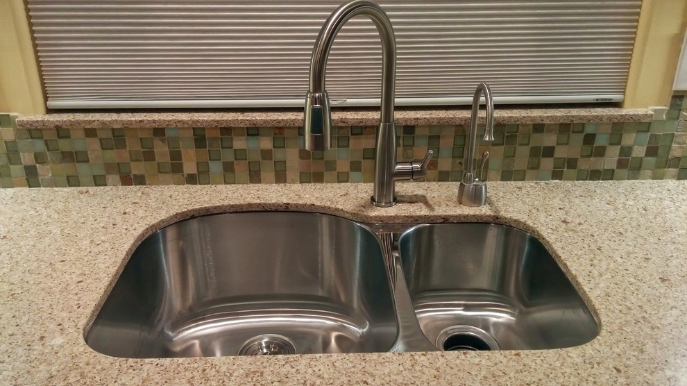 Example of a transitional kitchen design in Seattle