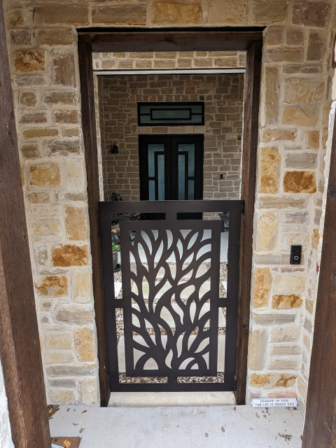 View of front door from the gatehouse american-southwest-entry