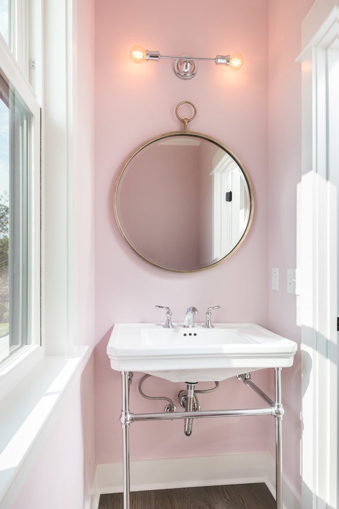 This is an example of a transitional powder room in Other.