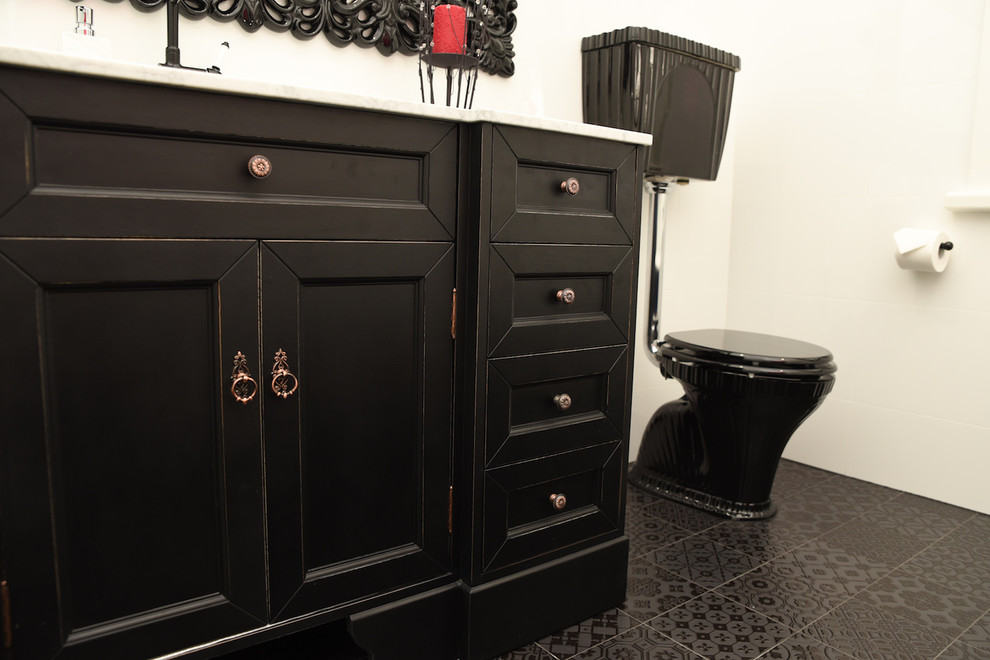 Photo of a mid-sized traditional master bathroom in Adelaide with shaker cabinets, black cabinets, a claw-foot tub, a corner shower, a two-piece toilet, white tile, ceramic tile, white walls, ceramic floors, a drop-in sink, marble benchtops, black floor and a hinged shower door.