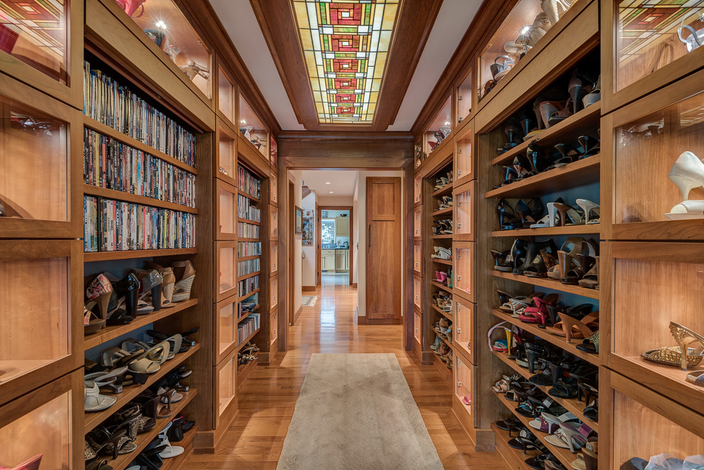 This is an example of a large arts and crafts storage and wardrobe in Chicago with medium hardwood floors.