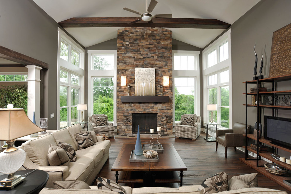 Design ideas for a contemporary open concept living room in Columbus with grey walls, dark hardwood floors, a standard fireplace, no tv and exposed beam.