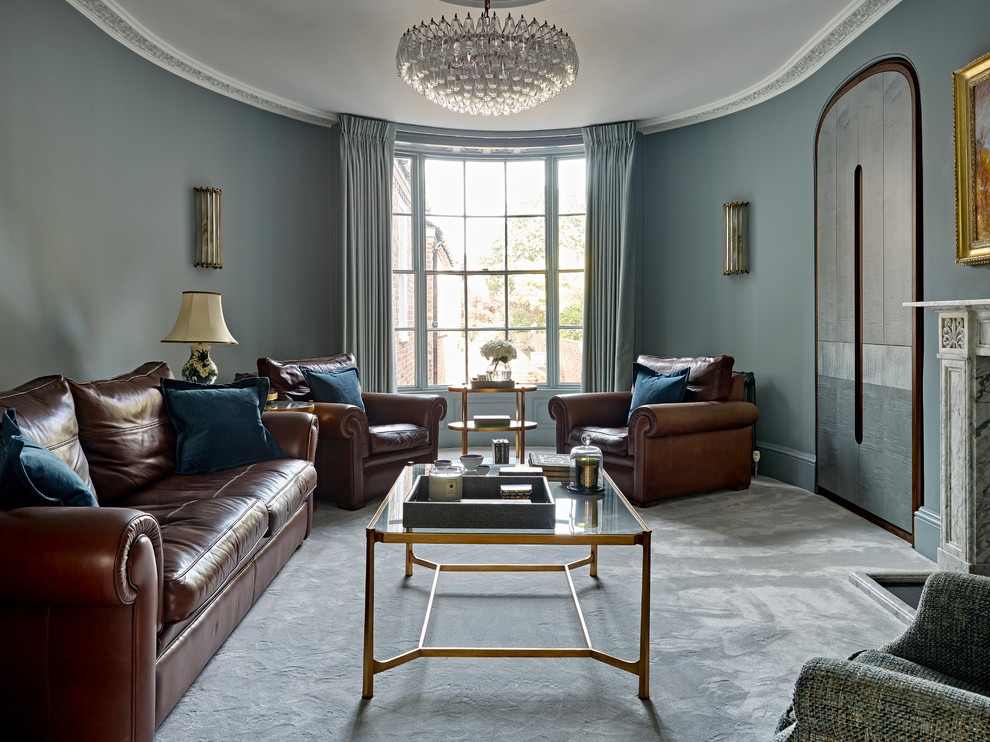 Mid-sized traditional enclosed living room in London with carpet, a stone fireplace surround, grey floor, blue walls and a standard fireplace.