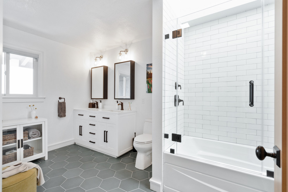 Large transitional master bathroom in San Francisco with beaded inset cabinets, white cabinets, an alcove tub, a shower/bathtub combo, a bidet, white walls, mosaic tile floors, an undermount sink, granite benchtops, blue floor, a hinged shower door, white benchtops, a double vanity and a built-in vanity.